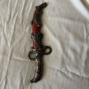 Ornate Decorative Dagger with Red Blade
